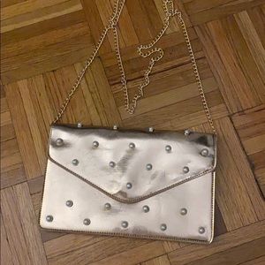 Rose gold/pearl clutch